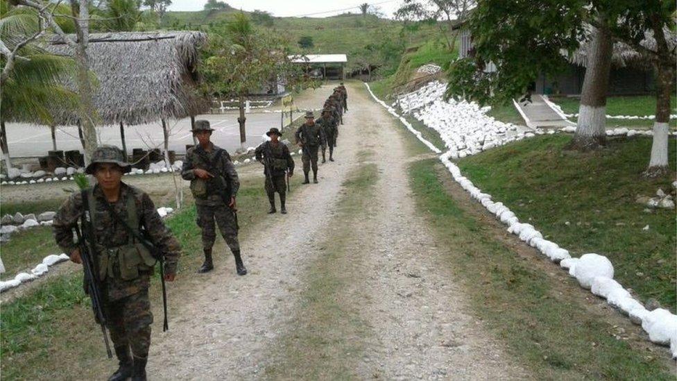 Guatemalan soldiers patrol near the border with Belize. Photo: 21 April 2016