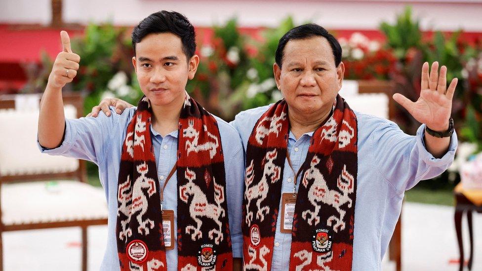 Indonesia's defence minister and presidential candidate, Prabowo Subianto, along with his running mate, Gibran Rakabuming Raka,