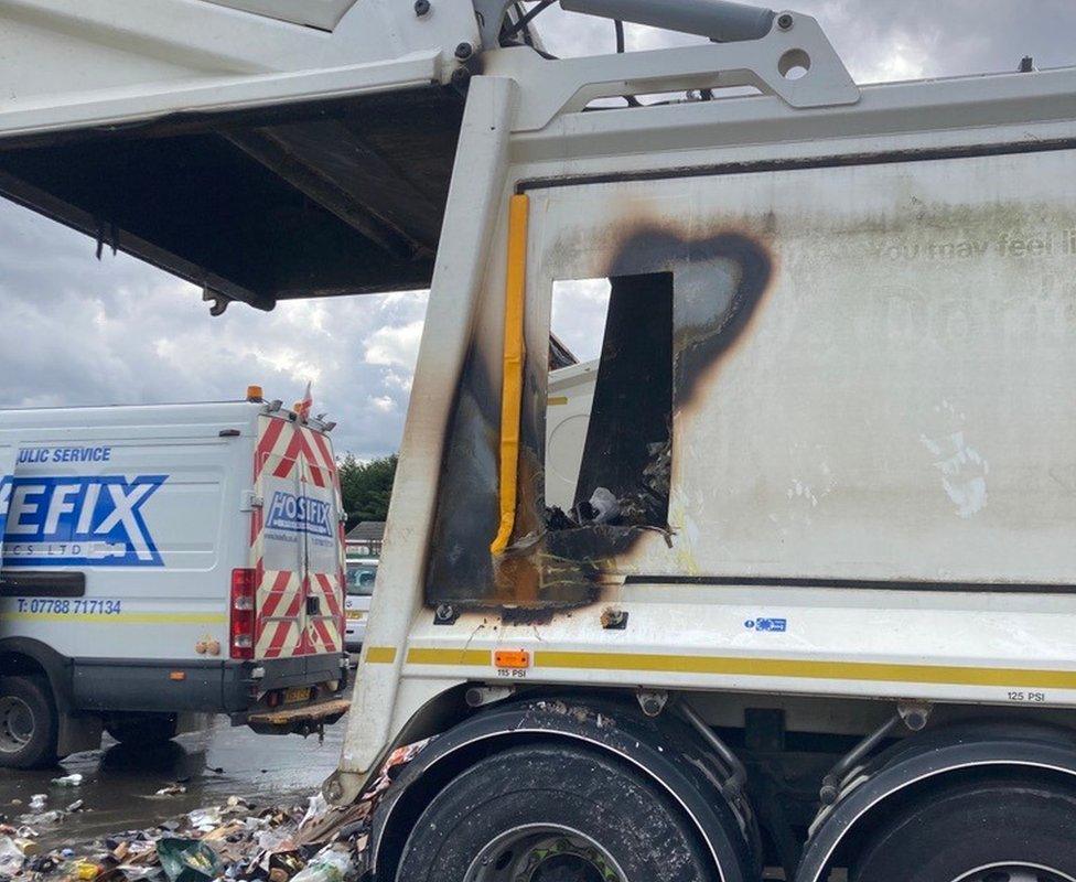 Burnt hole in back of lorry