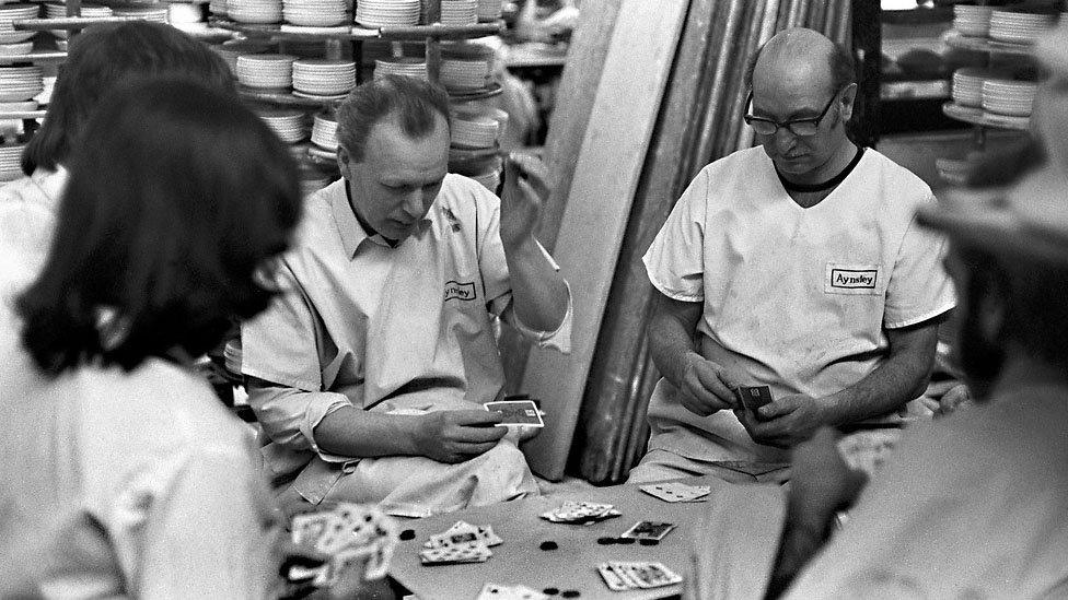 Pottery workers playing cards