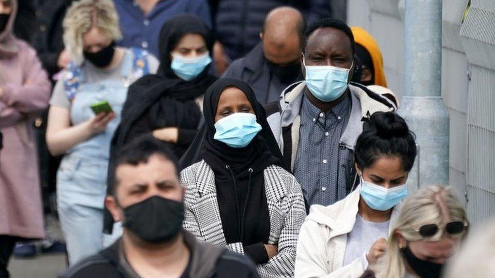 people-queuing-for-vaccine.