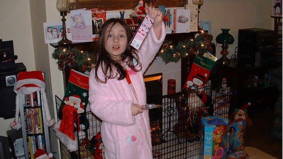 Rachel as a young girl on Christmas Day