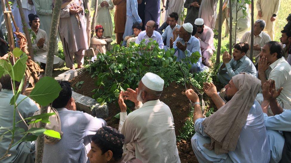 Mourners at Mashal Khan's grave