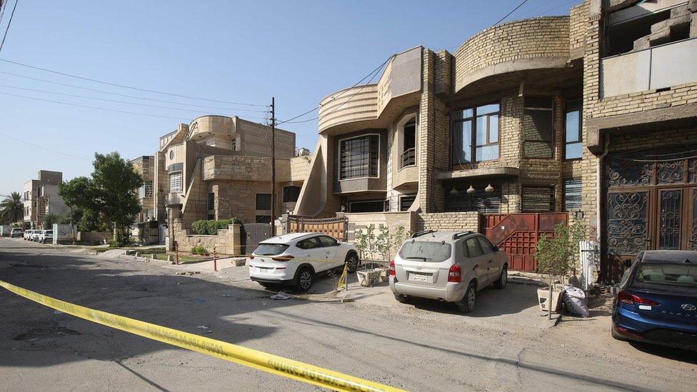 Police tape around the home of Hisham al-Hashimi in Ziyouna, Baghdad (7 July 2020)