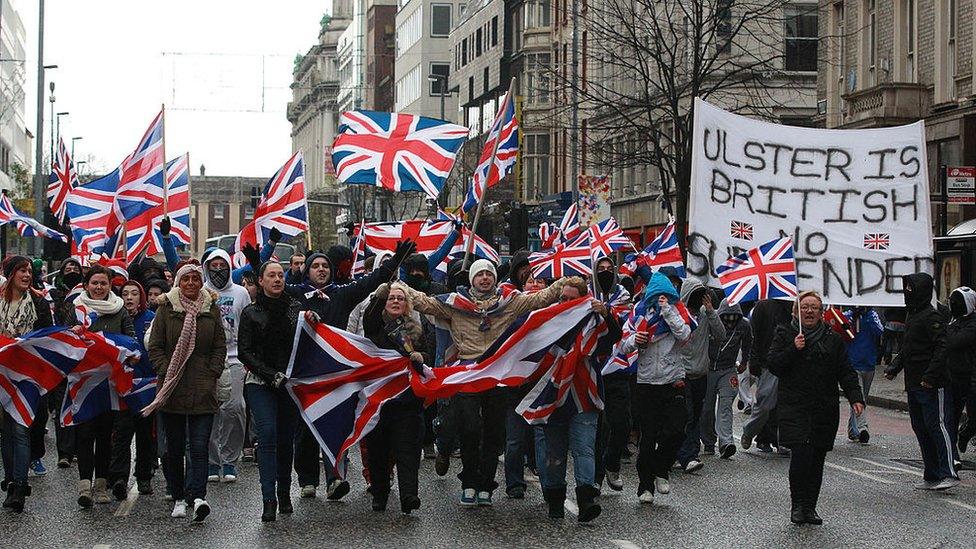 A vote to reduce flag-flying at Belfast City Hall led to protest marches and rallies in 2012