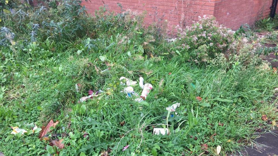 Litter discarded outside the PDSA centre in Butetown