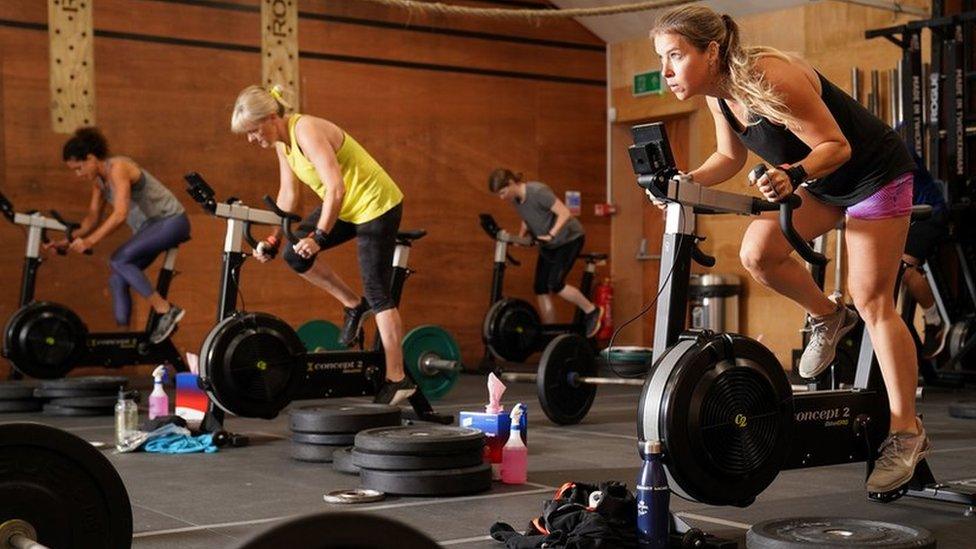 People on bikes at the gym