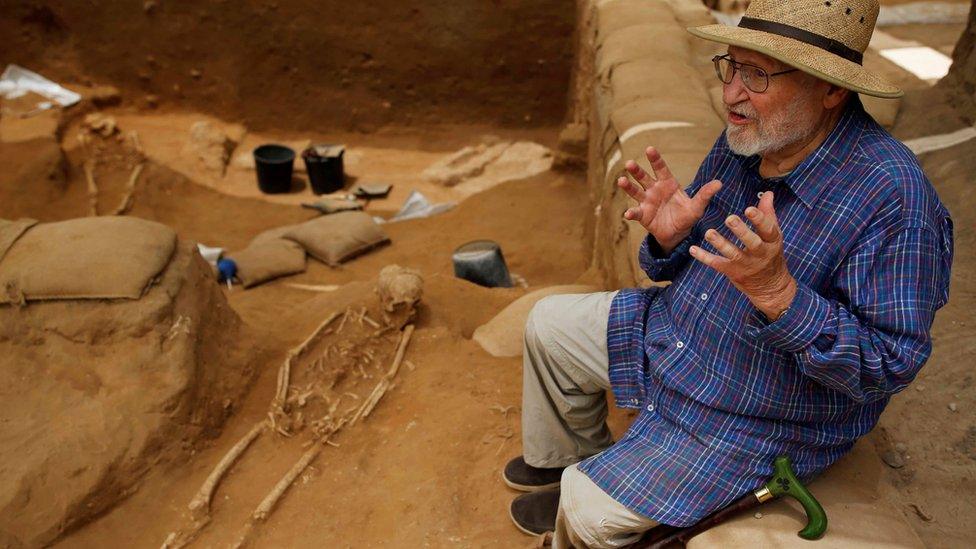 Professor Lawrence E. Stager, Dorot Research Professor of the Archaeology of Israel, speaks during an interview with Reuters near a partly unearthed skeleton at excavation site of the first-ever Philistine cemetery at Ashkelon National Park in southern Israel June 28, 2016.