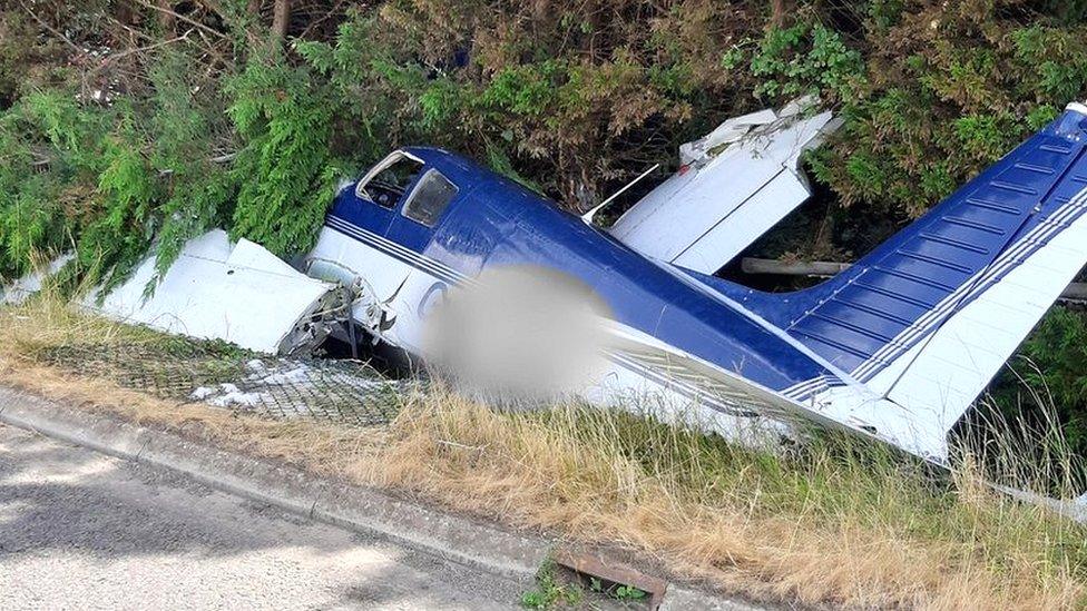 Light aircraft in a ditch after crashing