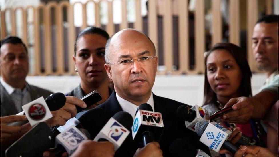 The Attorney General of the Dominican Republic Francisco Dominguez Brito, talks to the press about the extradition of French citizen Christophe Naudin, presumably involved in the escape of two French pilots who had been sentenced to 20 years for drug trafficking, in Santo Domingo on March 3, 2016