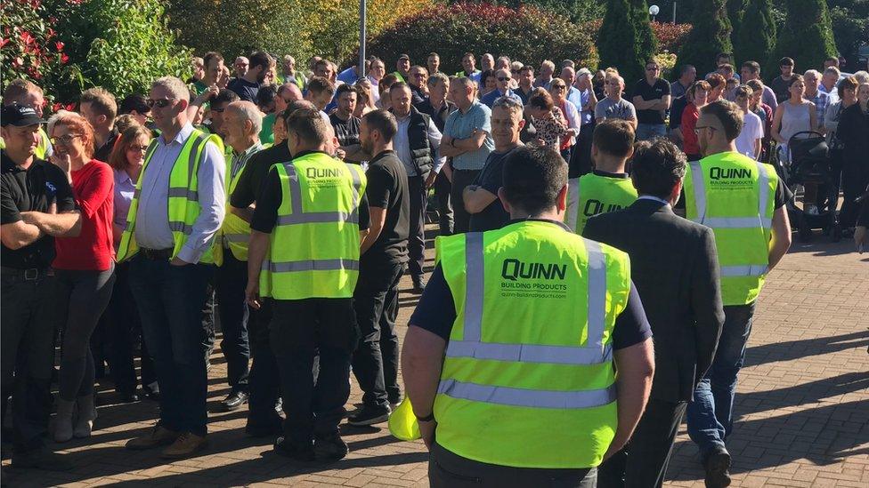 Workers stage rally