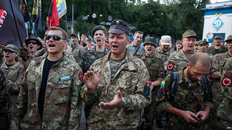 Members and supporters of Right Sector and other ultra-right political parties attend a protest on Grushevskogo street in Kiev, Ukraine, 3 July 2015