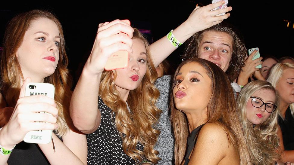 Ariana Grande with fans in 2014