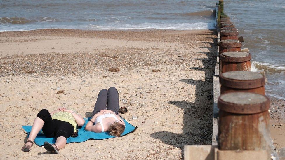 Visitors to Southwold in Suffolk enjoying the sunshine