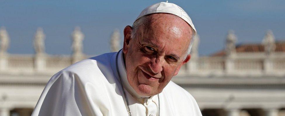 Pope Francis looks on at the end of the Wednesday general audience in Saint Peter"s square at the Vatican November 22, 2017.