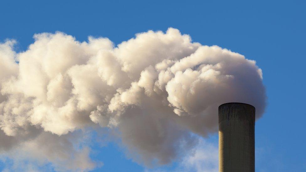 Chimney spewing out smoke