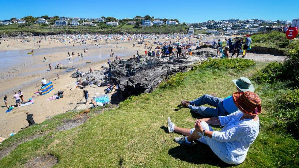 holiday makers at Polzeath Cornwall