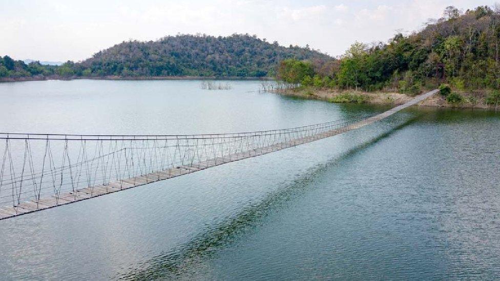 A bridge going over a reservoir in the national park