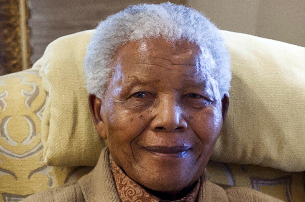 Former South African President Nelson Mandela is pictured during a visit by former US president on July 17, 2012 at his home in Qunu, Eastern Cape,