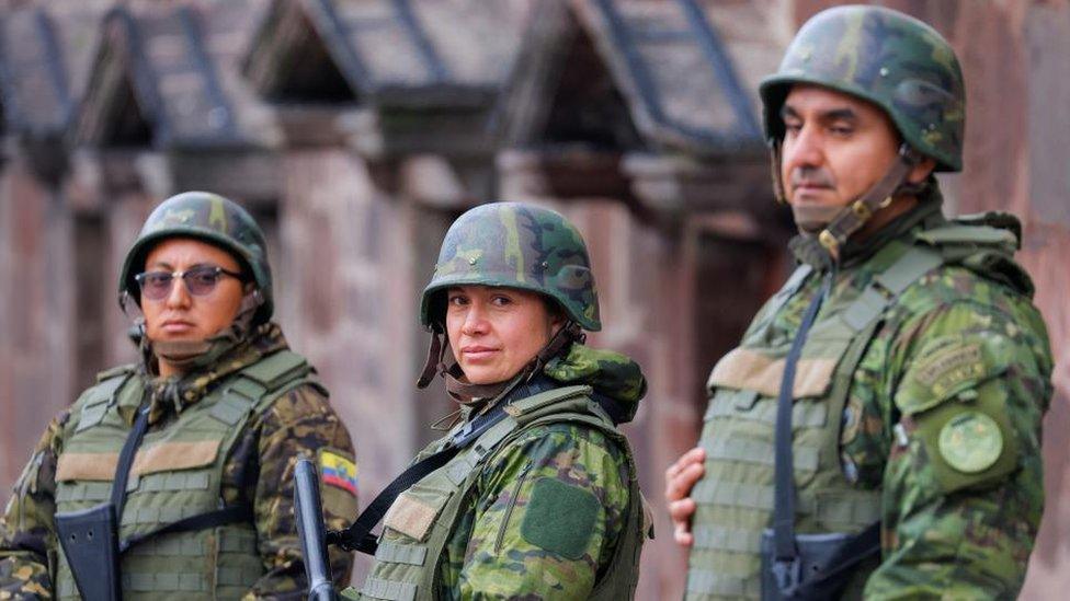 Soldiers stand guard outside the presidential palace following a wave of violence around the nation, prompting President Daniel Noboa to declare gangs to be terrorist organisations to be hunted by the military, in Quito, Ecuador January 10, 2024.