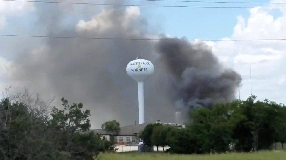 Smoke rises above the Coryell Memorial Hospital in Gatesville, Texas