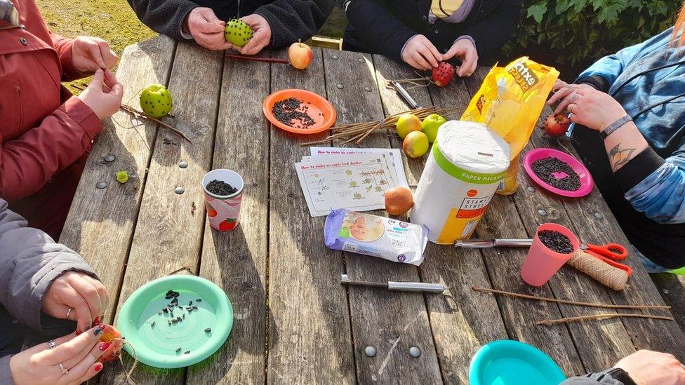 The group making birdfeeders