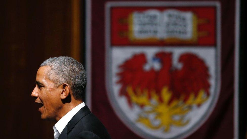 Obama in front of UofC sign