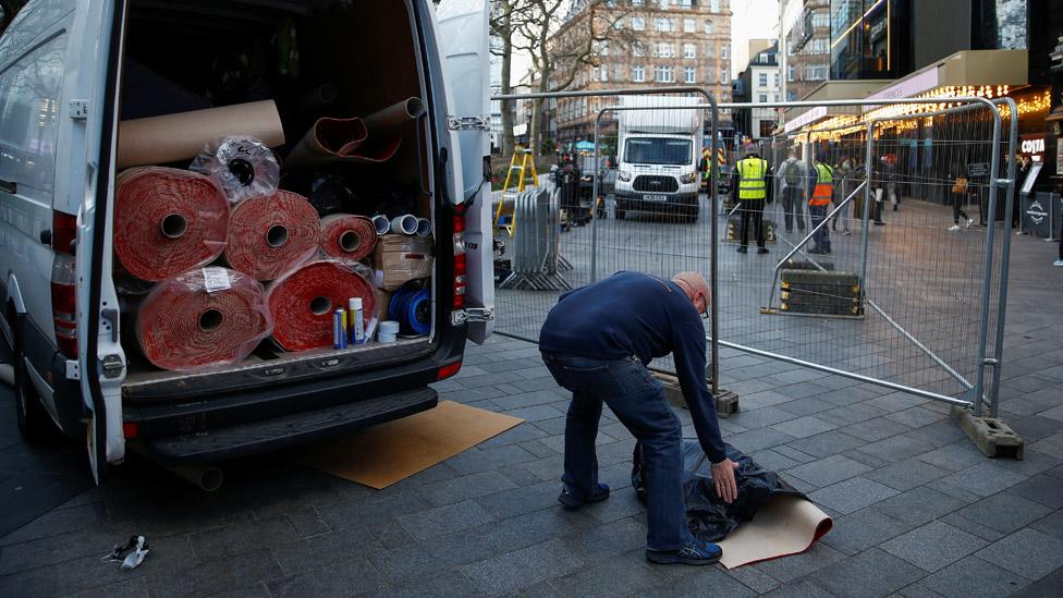 The unused red carpet was rolled up outside the Mulan European premiere on Thursday