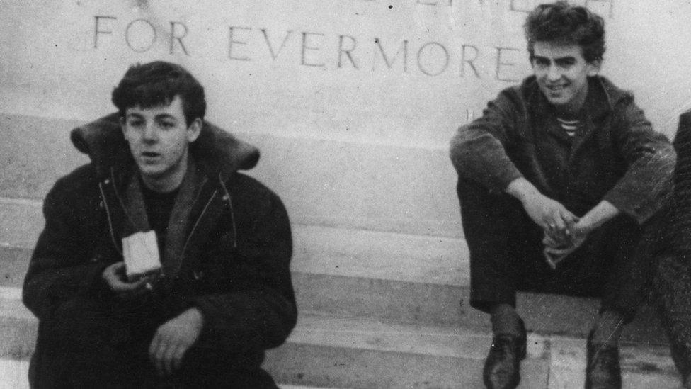 Paul McCartney and George Harrison in 1960