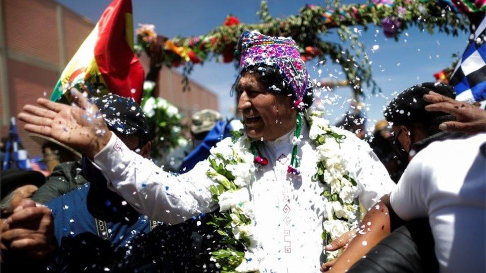 Bolivia's former President Evo Morales greets supporters during a caravan between Uyuni and Oruro, upon his return to the country, in Uyuni, Bolivia November 10, 2020