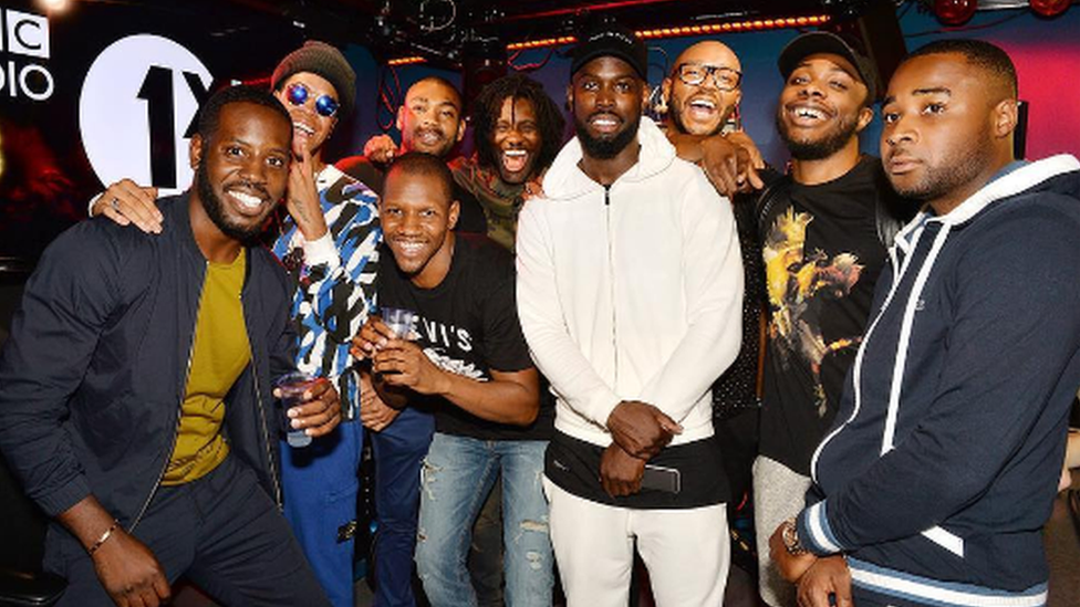 This a photo a grime and UK rap artists after an interview with radio 1's Mista Jam. (Pictured: Chipmunk, Kano, Wretch 32, Giggs, Ghetts)