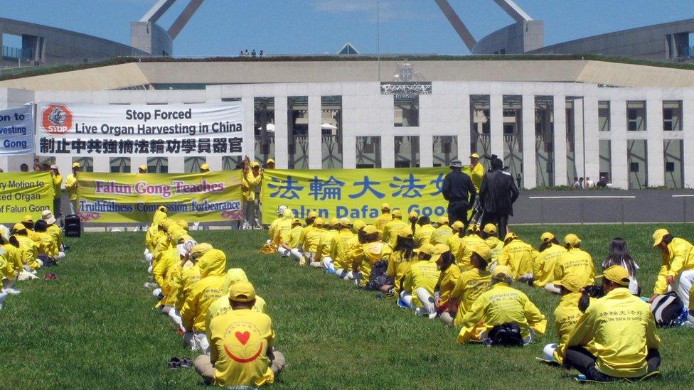 Falun Gong practitioners demonstrate outside Australia"s Parliament House