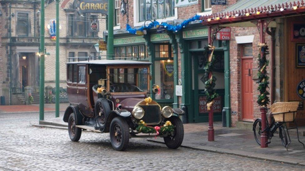 Vintage car in vintage street at Beamish Museum