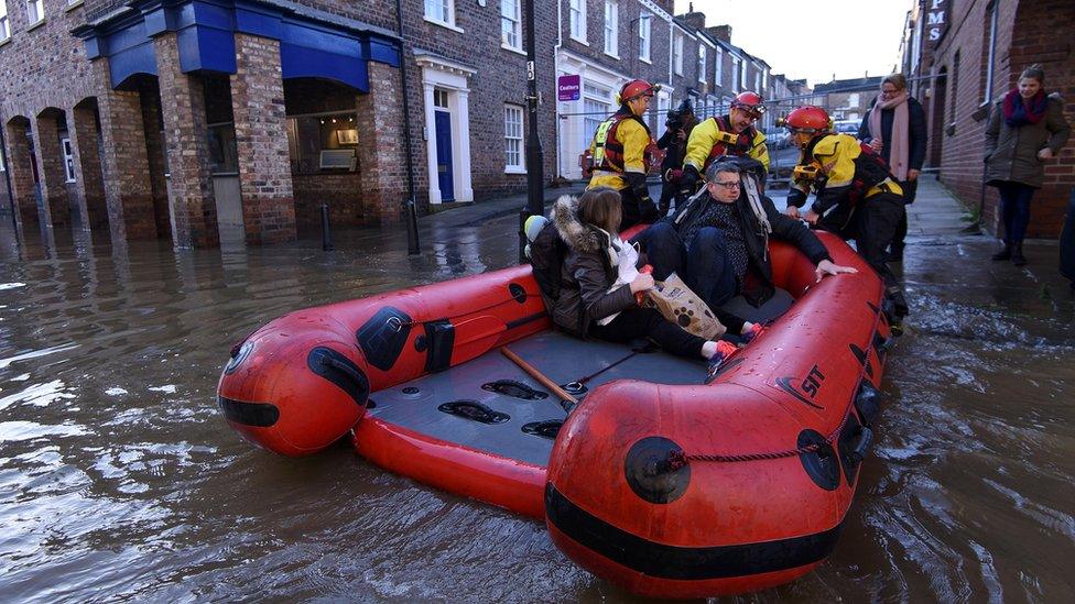 York residents on a dinghy during the 2015 floods