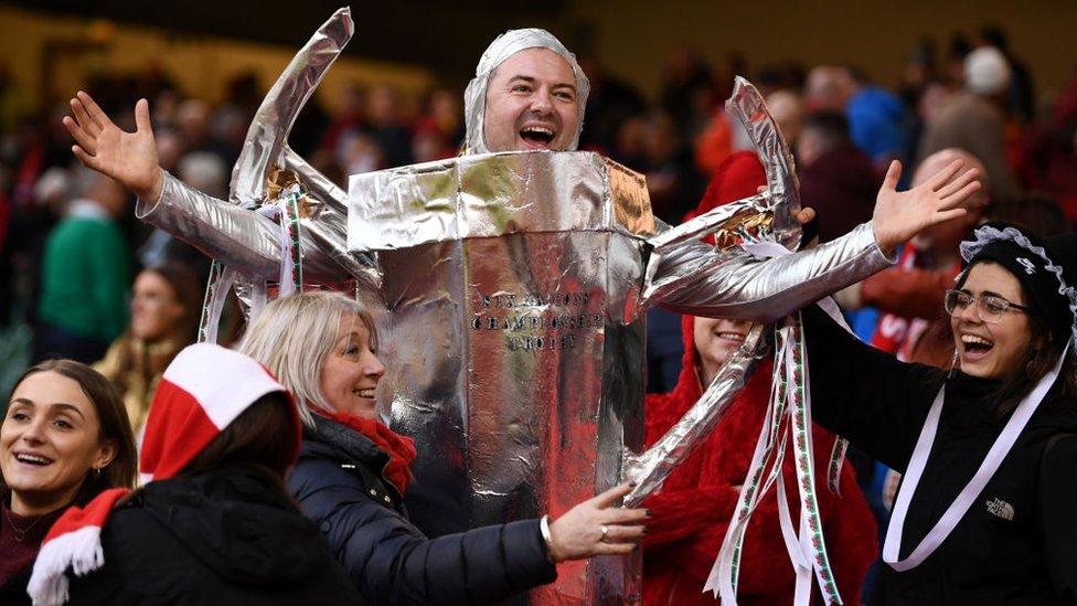 Wales fan dressed as trophy