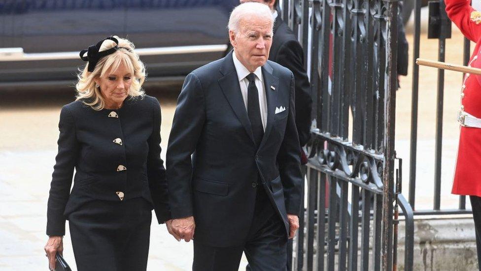 US President Joe Biden enters Westminster Abbey with his wife Jill