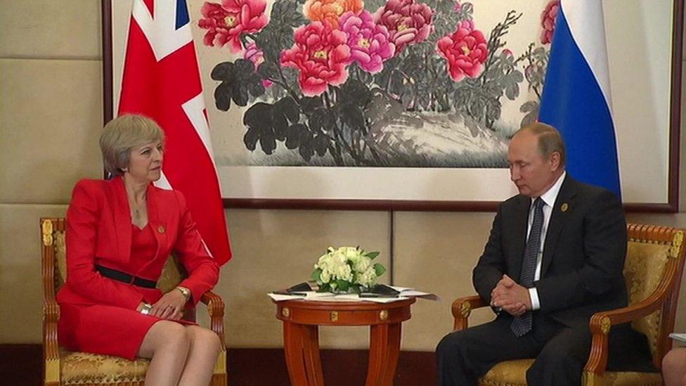 Theresa May and Vladimir Putin