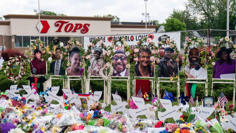 Vice President Kamala Harris and Second Gentleman Doug Emhoff pay their respects at a memorial at Tops Friendly Market