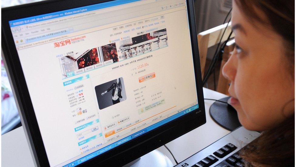 A woman shops on Alibaba (file image)