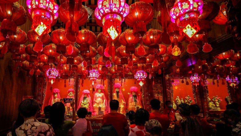 People pray to welcome the Chinese Lunar New Year at a Chinese Buddhist temple in Chinatown, Bangkok, Thailand, 22 January 2023. The Chinese lunar new year, or Spring Festival as it is known in China, and Tet in Vietnam, falls on 22 January 2023 and heralds the start of the Year of the Rabbit, one of the 12 animals of the Chinese Zodiac.