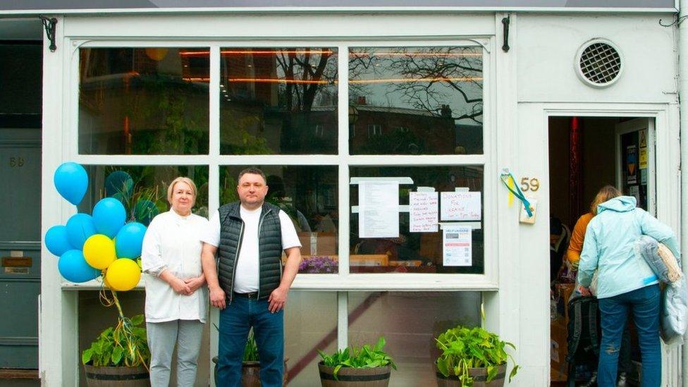 Galyna and Alex outside Prosperity restaurant