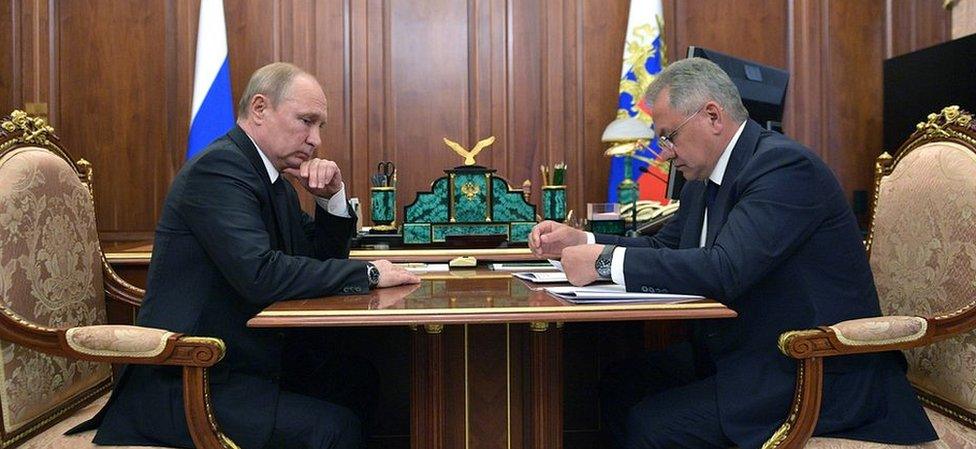 Russian President Vladimir Putin and Defence Minister Sergei Shoigu