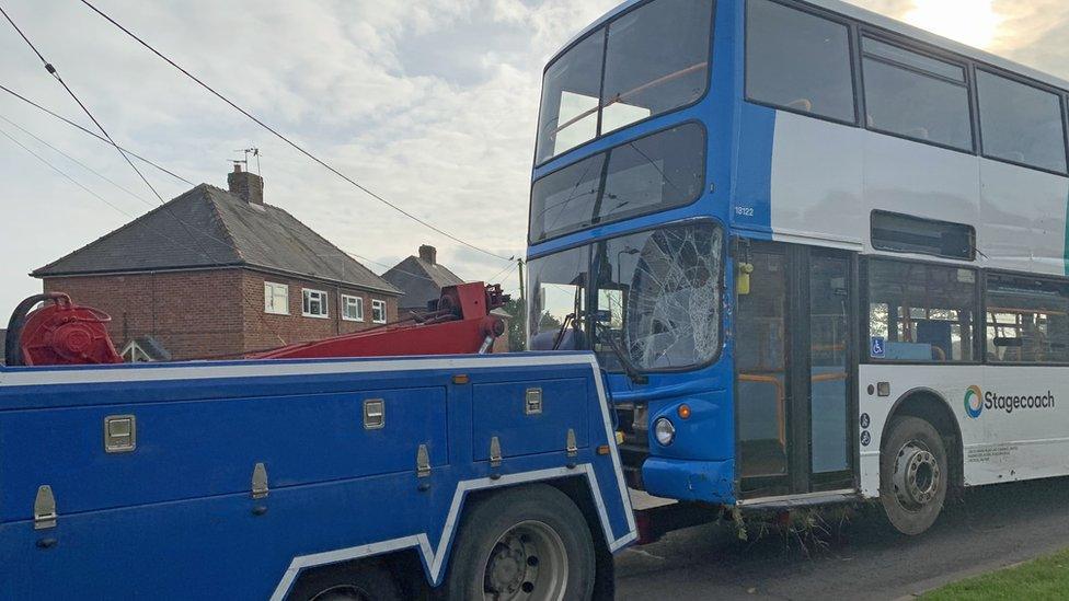 Bus being towed away