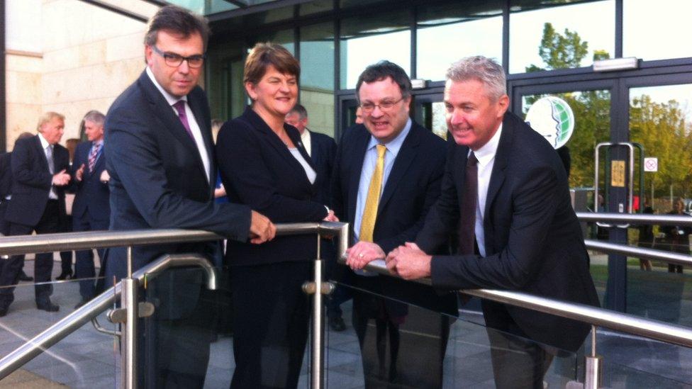 Alastair Hamilton of Invest NI, Executive ministers Arlene Foster and Stephen Farry and Alistair Niederer of Teleperformance outside the call centre in Enniskillen