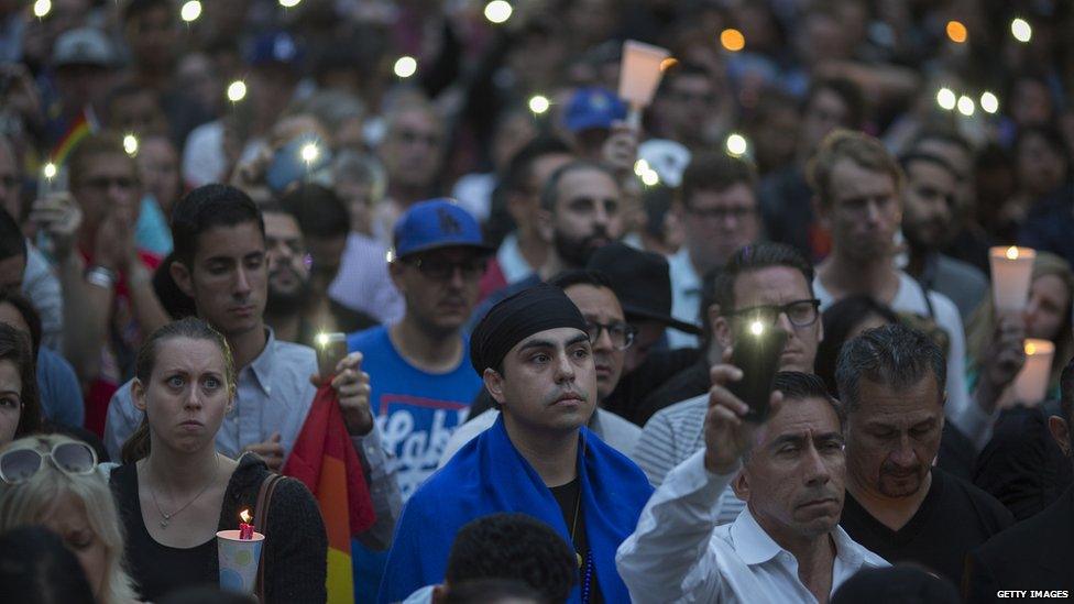 People holding candles