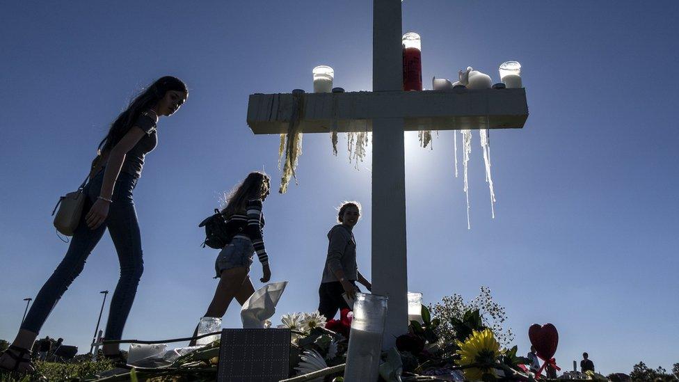 Students at a memorial in Parkland on Thursday