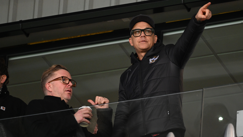 Robbie Williams attends Port Vale take on Portsmouth in League One