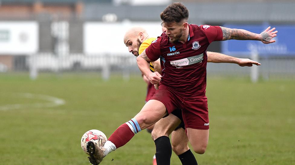 Matt Morton playing on the pitch