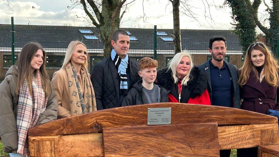 Phil Bennett's family at his memorial bench