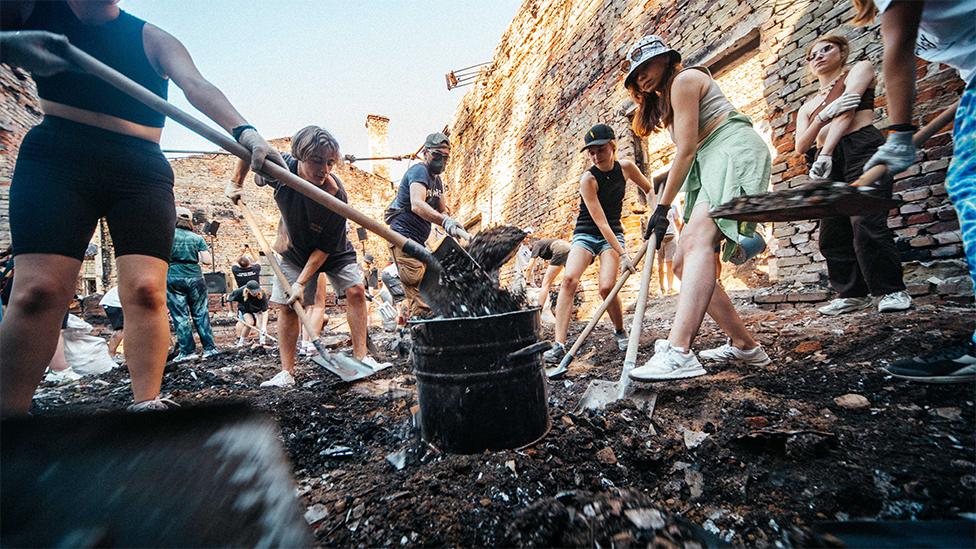 Volunteers cleaning up